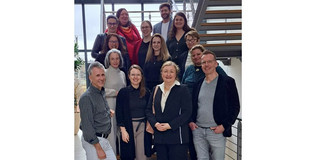 Workshop participants and ELLpH team in the stairwell of the Euro-FH.