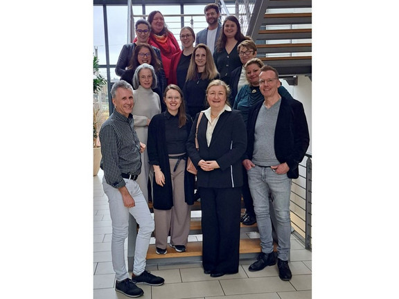 Workshop participants and ELLpH team in the stairwell of the Euro-FH.