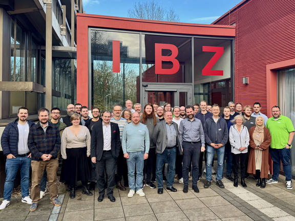 Participants in front of the entrance to the IBZ conference center.