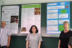 H.-A. Burghardt, S. Kwon, W. Wenzel und E. Doberstein vor ihrem Poster.